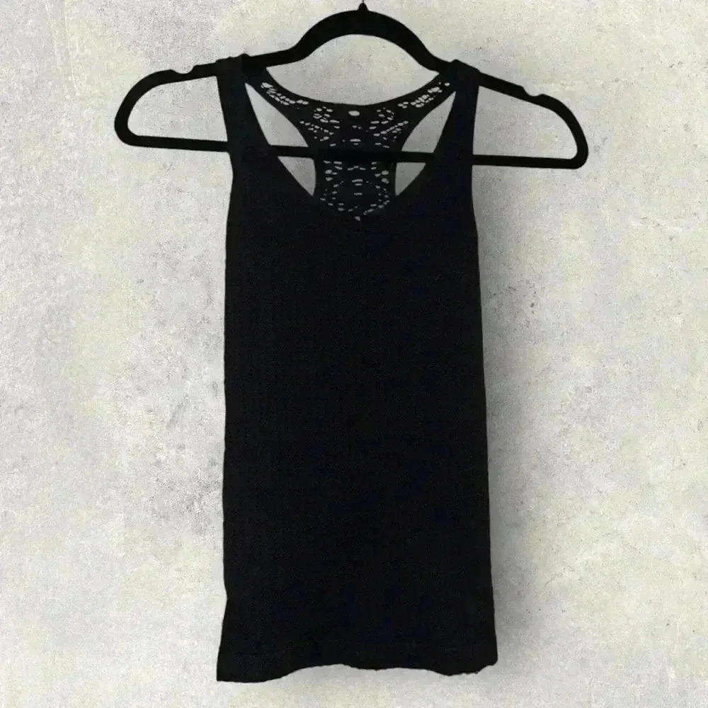 NWOT free people black tank top with peekaboo size XS/S